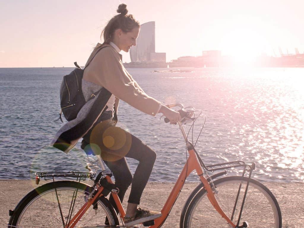 Barcelona beach girl Donkey Republic bike rental