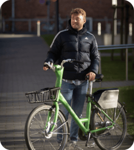 Standing next to a bike